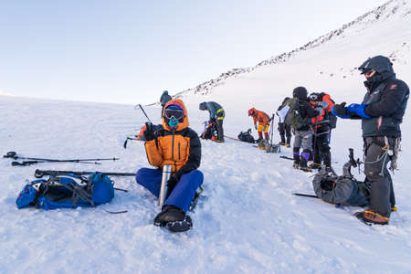 Caucasus / Russia - 06/08/2018 Group of climbers climbing mountain peak Elbrusのeditorial素材