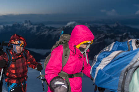 Caucasus / Russia - 07.23.2018 Group of climbers climbing mountain peaks.のeditorial素材