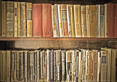 antique books and old bookshelf の写真素材
