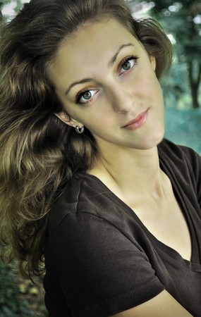 beautiful young woman portrait, posing in nature