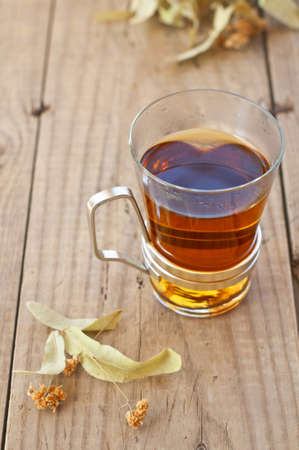 cup of tea and linden flowers の写真素材