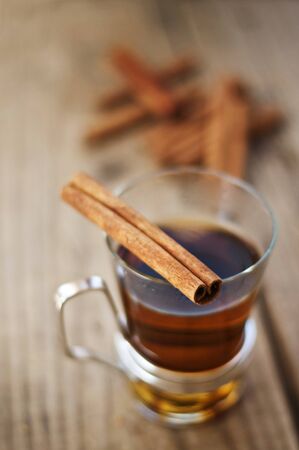 cup of tea and cinnamon stick over