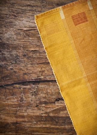 Tablecloth on wooden table backgroundの写真素材