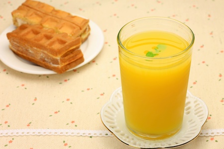 orange juice and waffle の写真素材