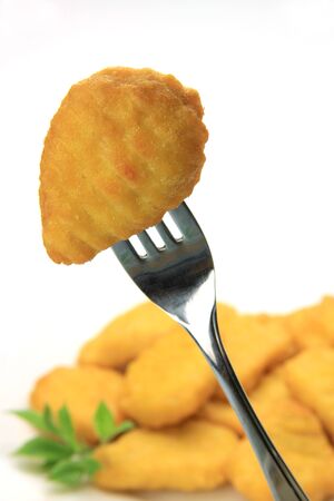 I took chicken nugget in a white background.の写真素材