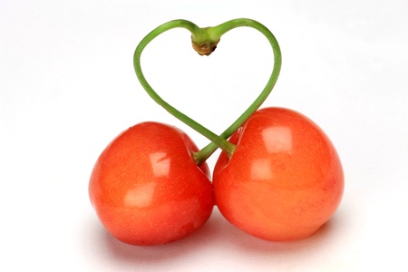I made heart with the spindle of the cherry.の写真素材
