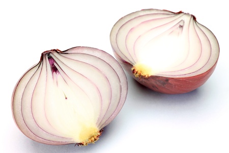 I took a red onion in a white background の写真素材
