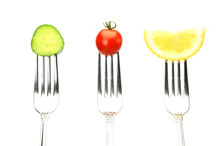 I stung food with a fork and took it in a white background の写真素材