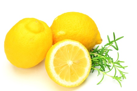 I took a lemon and a rosemary in a white background.の写真素材