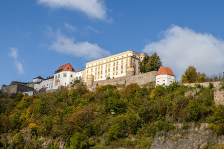View at fortress Veste Oberhaus in Passau during a ship excursion in autumn with colorfull treesのeditorial素材
