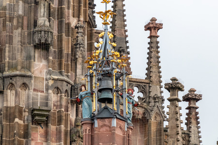 Close up of bells and other details from the Frauenkirche (woman church) in Nuremberg, Bavaria, Germanyのeditorial素材