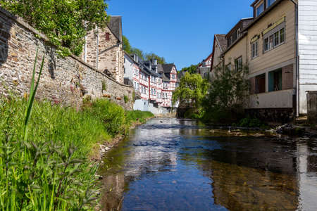 River elz with old bridge and half-timbered houses in Monreal, Germanyのeditorial素材