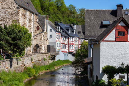 View at river elz, half-timbered houses in Monreal, Eifel, Germanyのeditorial素材