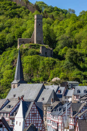 View at church and castle ruin Loewenburg in Monreal, Eifel, Germanyのeditorial素材