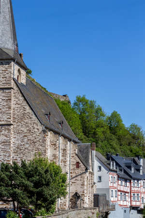 Scenic view on church and half-timbered houses in the village Monreal, Eifel, Germanyのeditorial素材