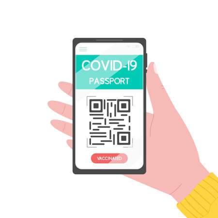 Hand holding smartphone with covid-19 vaccination passport. Electronic passport with QR code. Health...