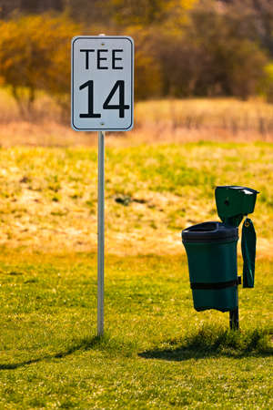 Notice sign Tee 14 as a guide to the tee off at the green on a golf course in Germanyの写真素材