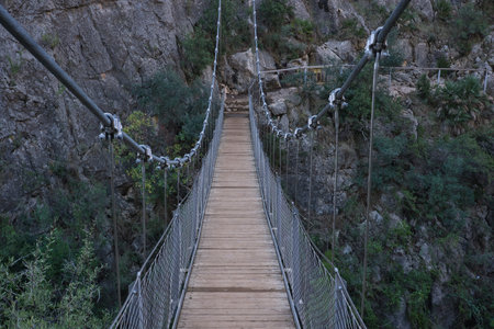 suspension bridge on the route of a thousand bridges, in Spainの写真素材