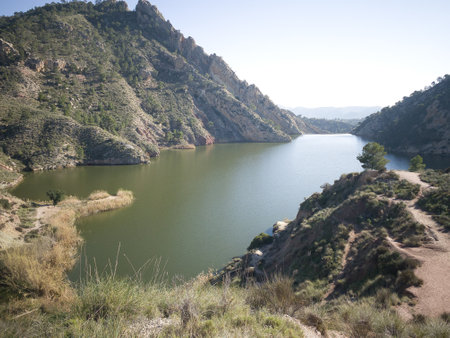view of the Tibi reservoir located in Alicante, Spain. Green lakeの写真素材