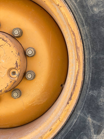 yellow excavator wheel on a construction site. yellowの写真素材