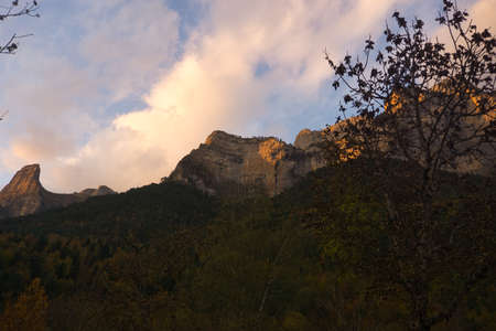 sunset in the meadow of the Ordesa y Monte Perdido National Park, in the Aragonese Pyrenees, located...