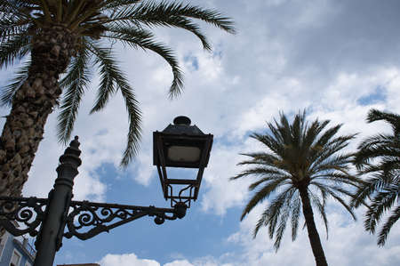 old street lamp on the street with clouds background, viewの写真素材