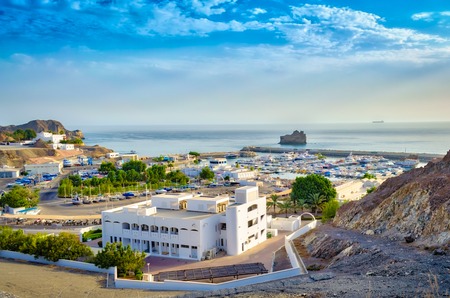 Top view of Oman seascape with blue sky and mountains.の写真素材