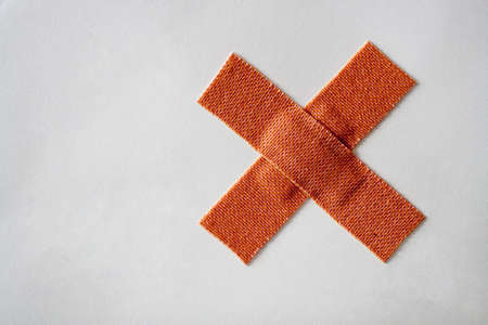 Bandage on white paperの写真素材