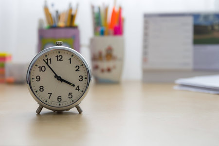 Alarm clock with white backgroundの写真素材