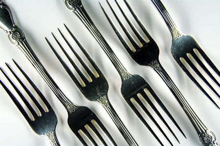 Kitchen Utensil. Six forks on a white background.