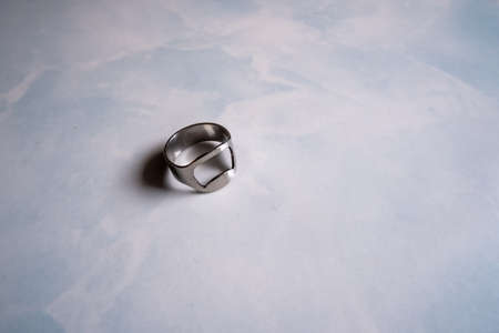 stainless steel ring can be worn as normal clear and used to open the bottle.の写真素材