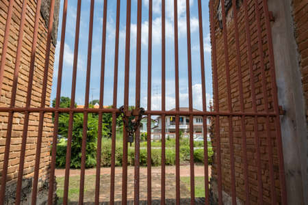 The entrance is locked with a steel cage, to prevent theft.