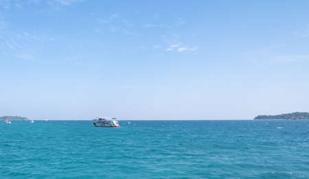 The ship was sailing between the two sides, and there was the sky above and the sea below,