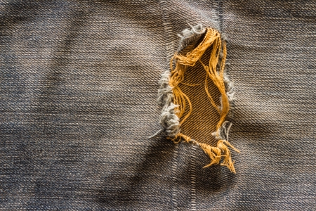 Torn jeansの写真素材