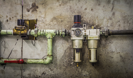 Closeup of a pressure meter on a machineの写真素材