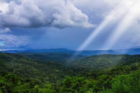 Majestic mountains landscape under morning sky with clouds. Overcast sky before storm.の写真素材