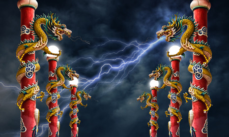 Dragon statue with lightning Stormの写真素材