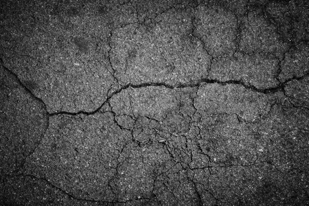 Crack asphalt backgroundの写真素材