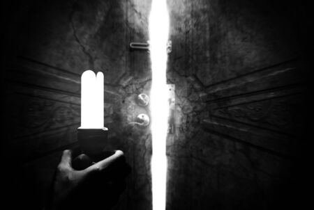 Haunted cracking open the door handles light bulbs.