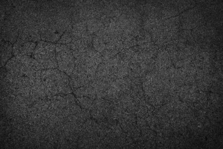 background texture of rough asphalt crackの写真素材