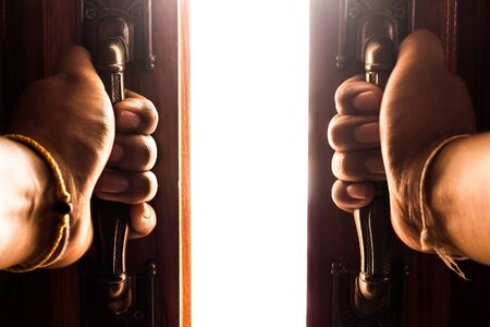 hand opens empty room door