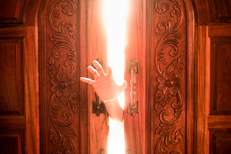 Hand open door lightの写真素材