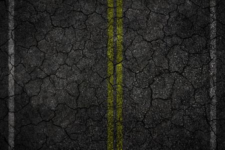Crack asphalt Road Texture with White Stripes and yellowの写真素材