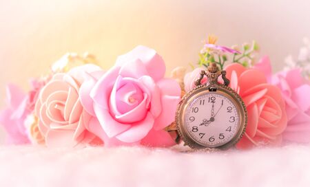 Pocket watch with rose bouquet sweet colorsの写真素材