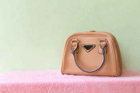 leather handbag on the table
