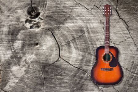 acoustic guitar wood background. vintage style.の写真素材