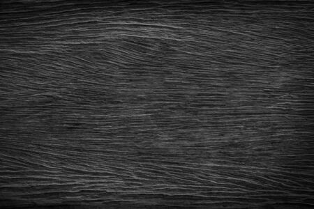 Black wooden texture background blank for designの写真素材