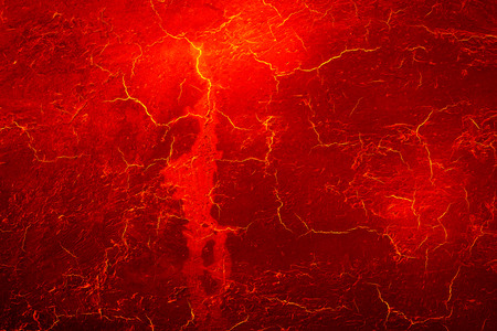 heat red cracked ground texture after eruption volcanoの写真素材