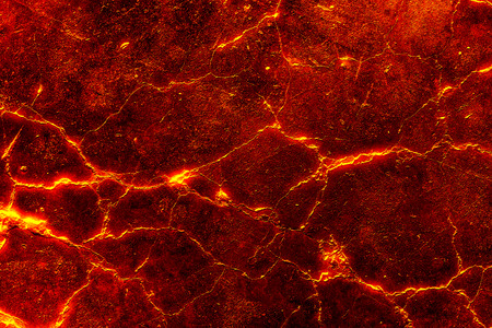 heat red cracked ground texture after eruption volcanoの写真素材