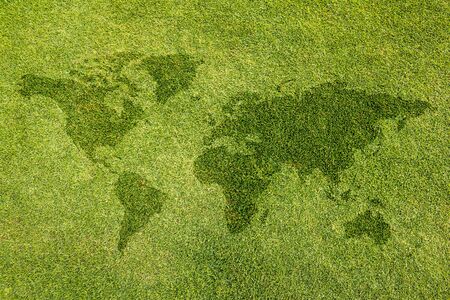 The world map on the lawn backgroundの写真素材
